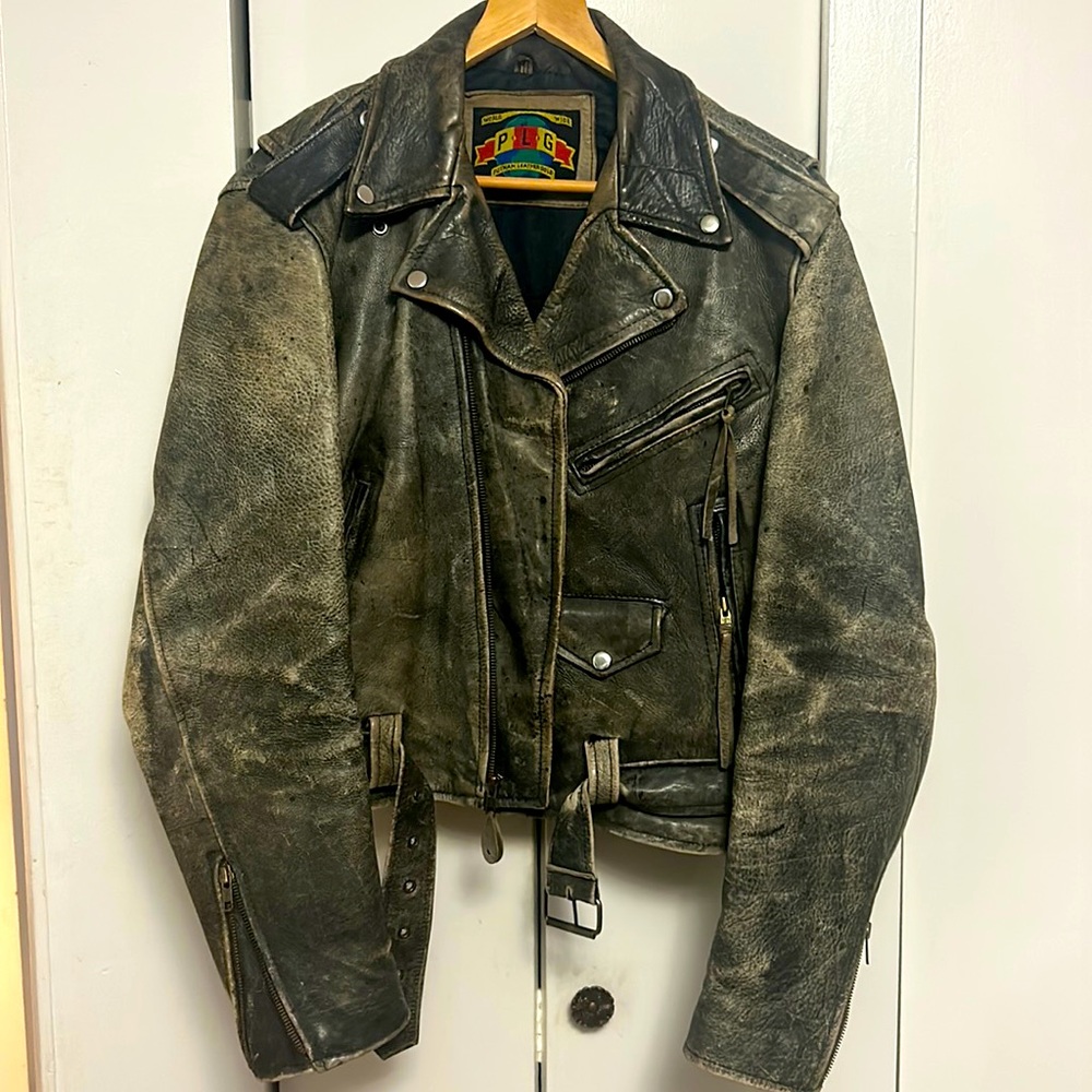 Beautifully distressed vintage motorcycle jacket